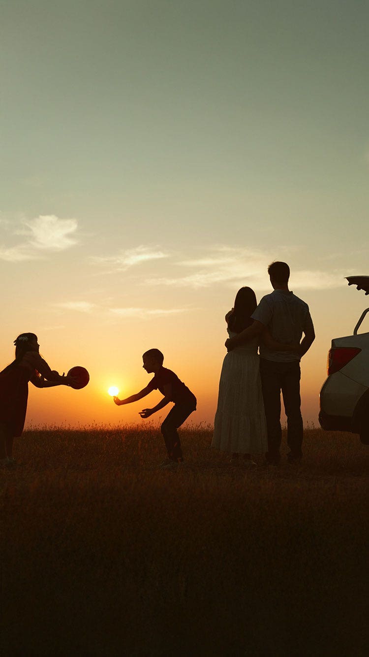 Family enjoying a scenic moment with their True Value car