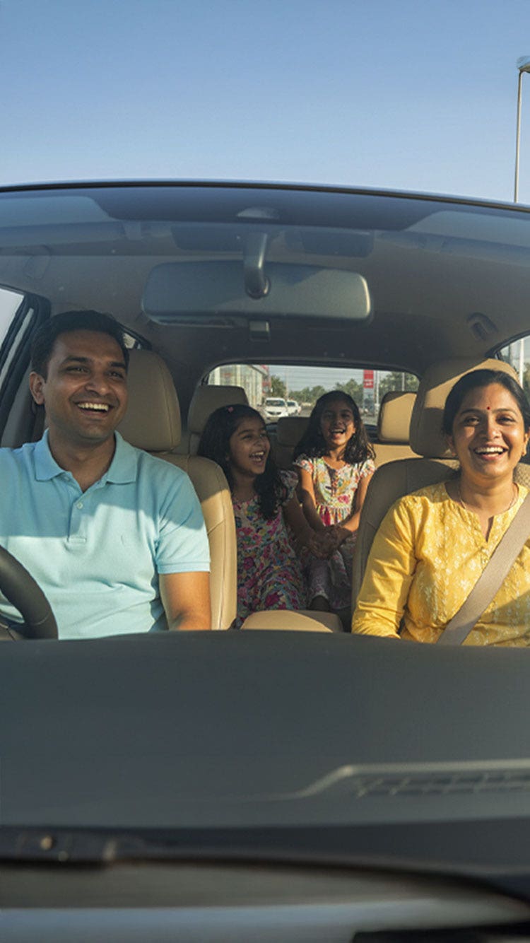 Family driving a certified True Value car